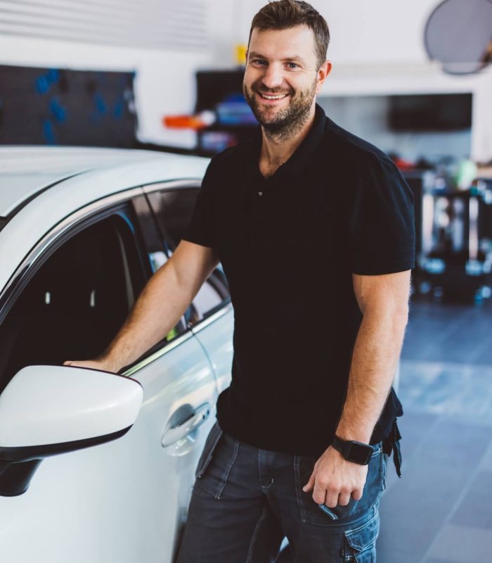 car-mechanic-in-workshop-1.jpg